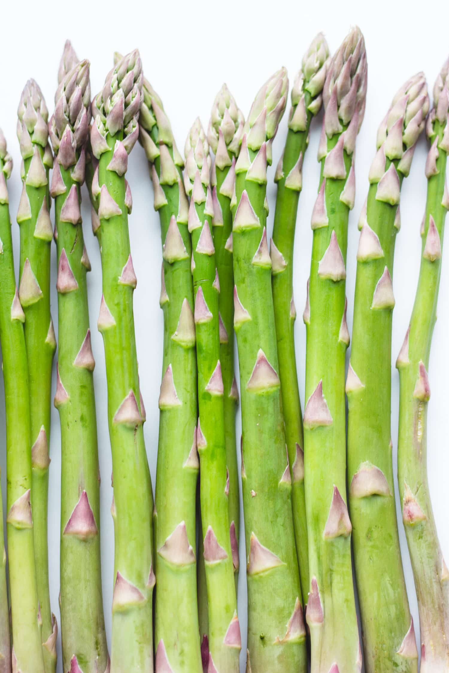 asparagus on a white surface