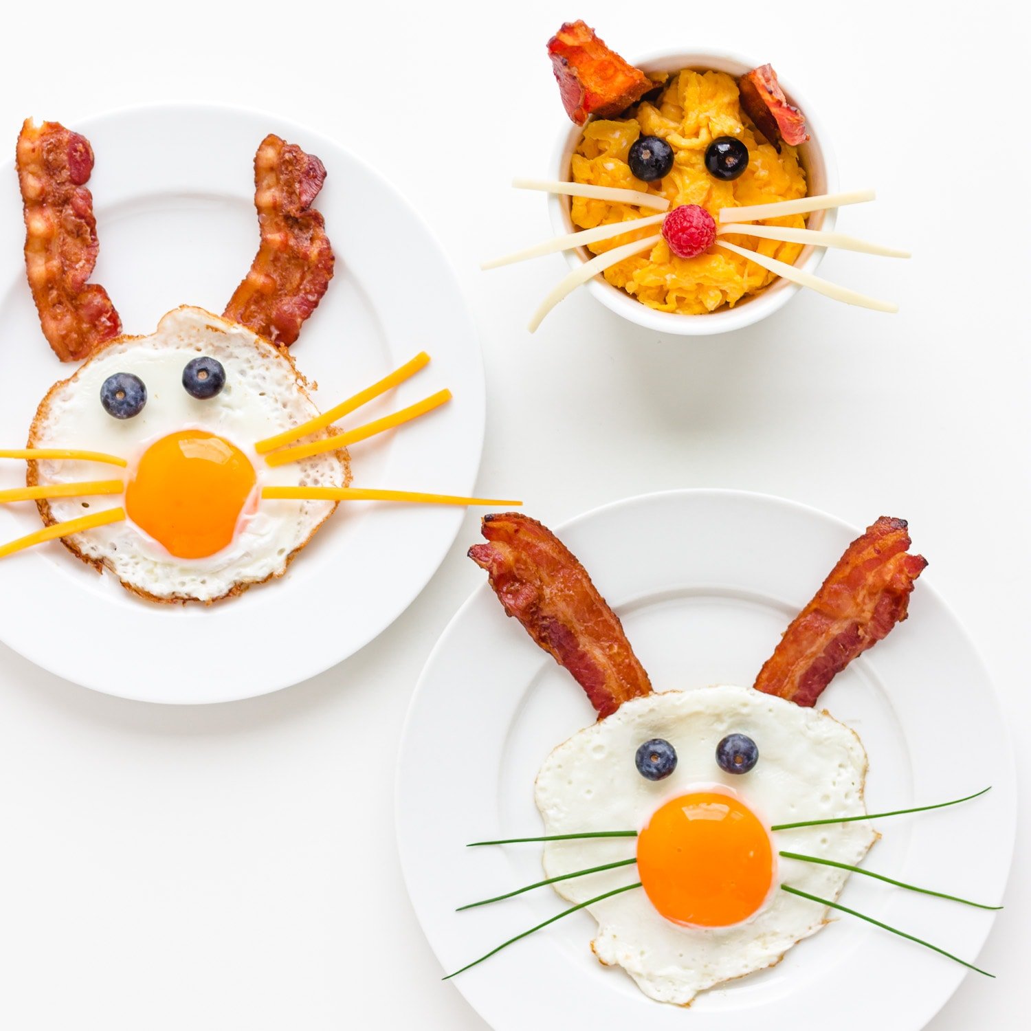 Three versions of bacon and egg bunnies using either fried eggs or scrambled eggs.