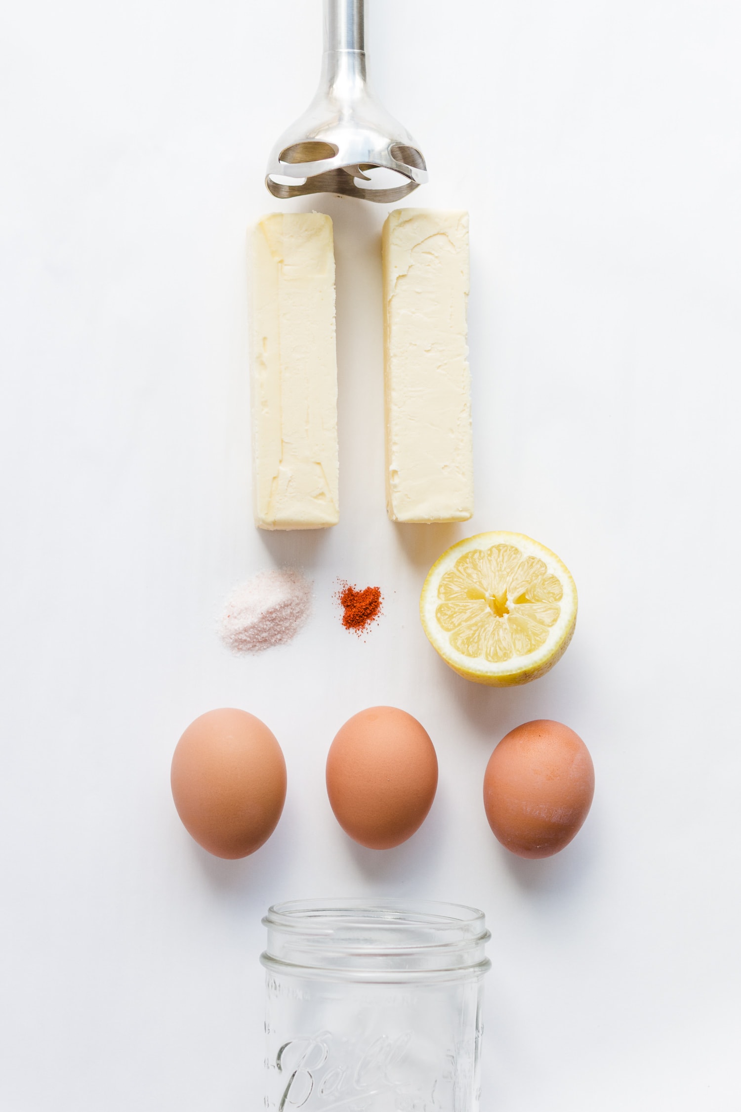 An overhead photo of ingredients needed for hollandaise sauce.