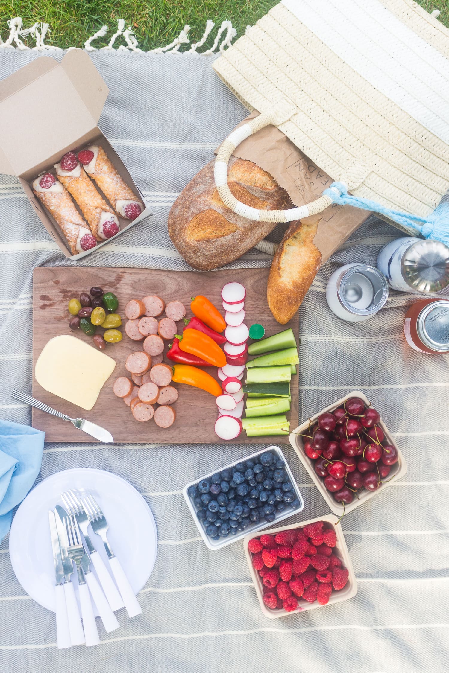 Overhead shot of a picnic set up on a blanket