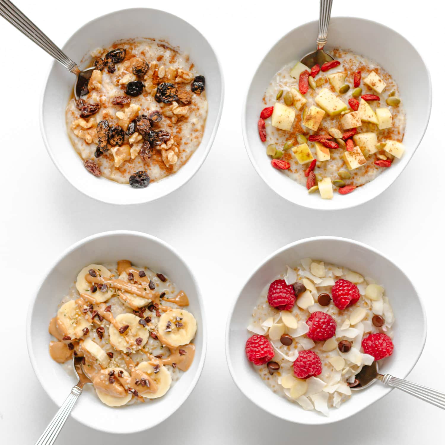 Four bowls of steel cut oats with different toppings.