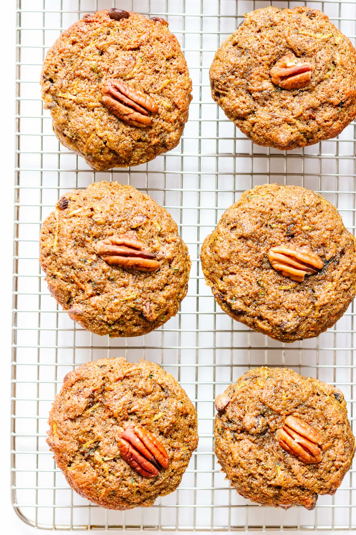 Overhead photo of muffins on a wire rack.