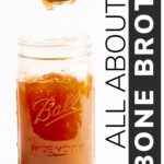 Jar of chilled broth with text overlay that says "All About Bone Broth"