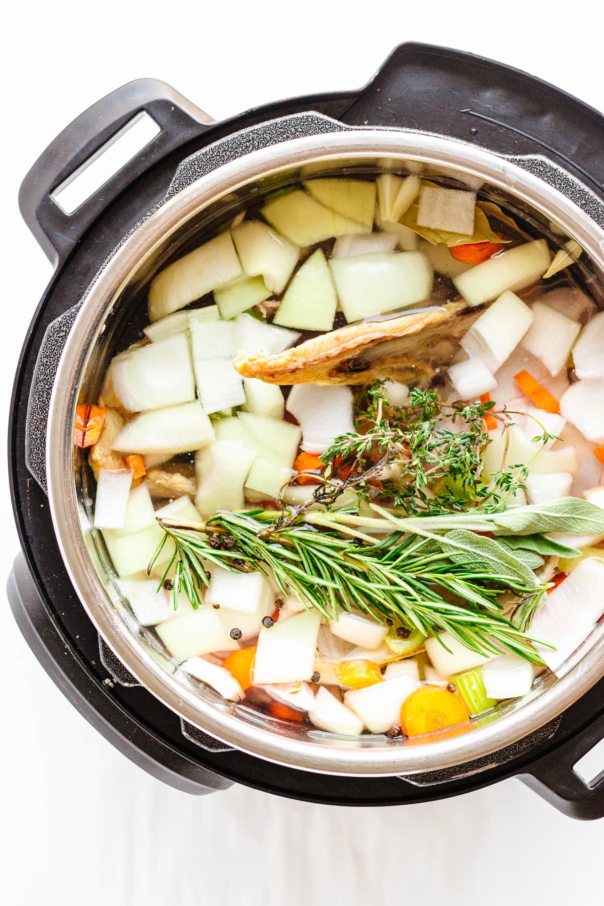 Overhead photo of chicken bone broth ingredients in the Instant Pot