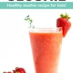 Glass of strawberry slushie with text overlay "Strawberry Slushie: Healthy slushie recipe for kids!"
