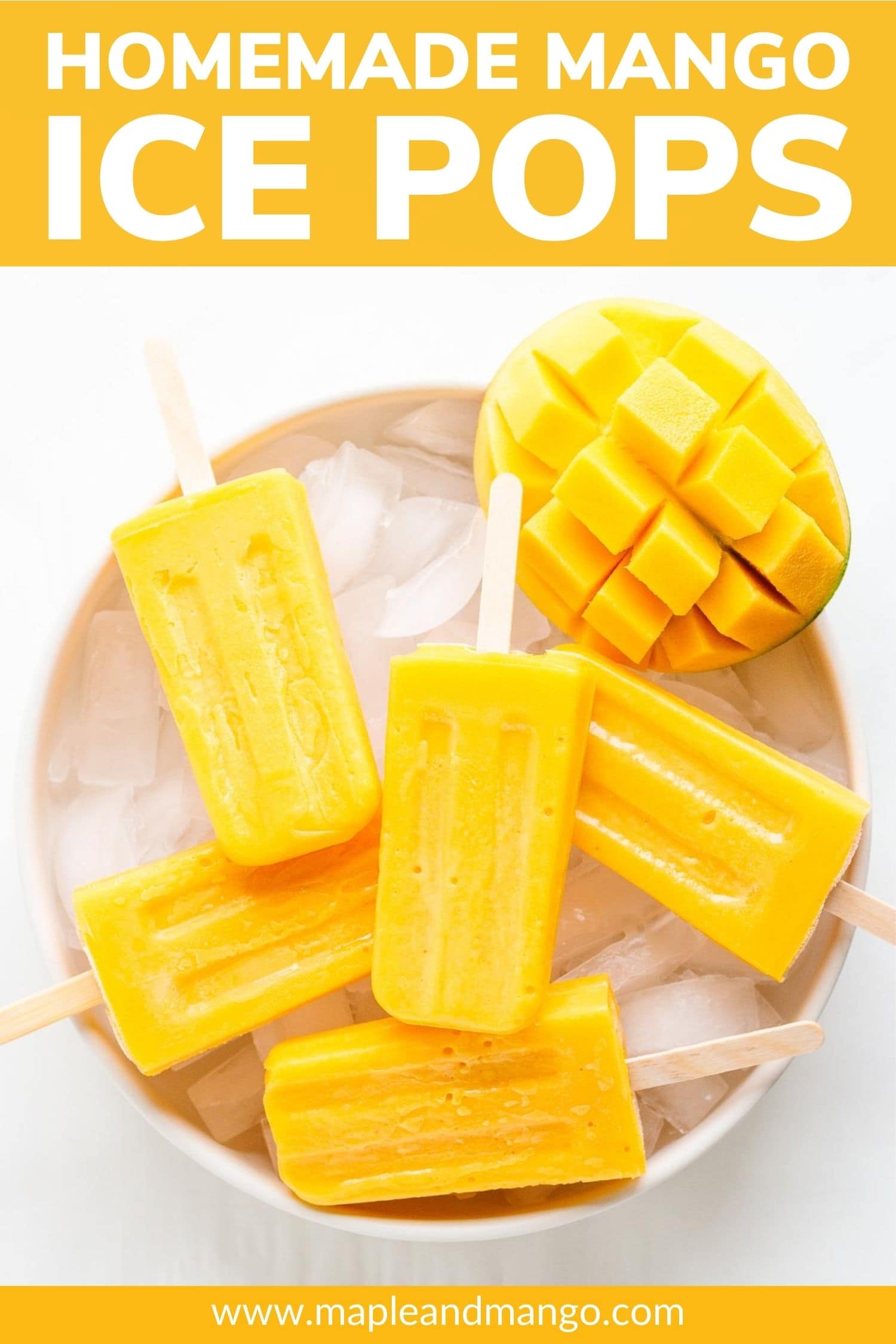 Popsicles and half a mango sitting in a bowl of ice with text overlay "Homemade Mango Ice Pops".