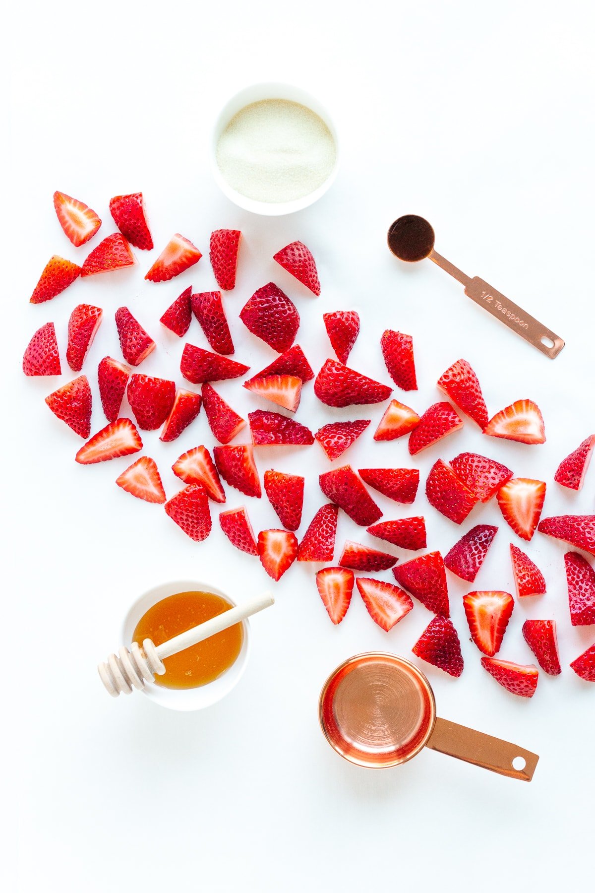 Ingredients needed to make healthy strawberry gummies.
