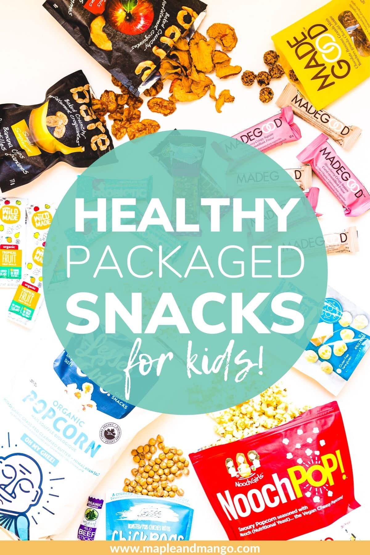 Overhead photo of a variety of store bought snacks with text overlay "Healthy Packaged Snacks For Kids"