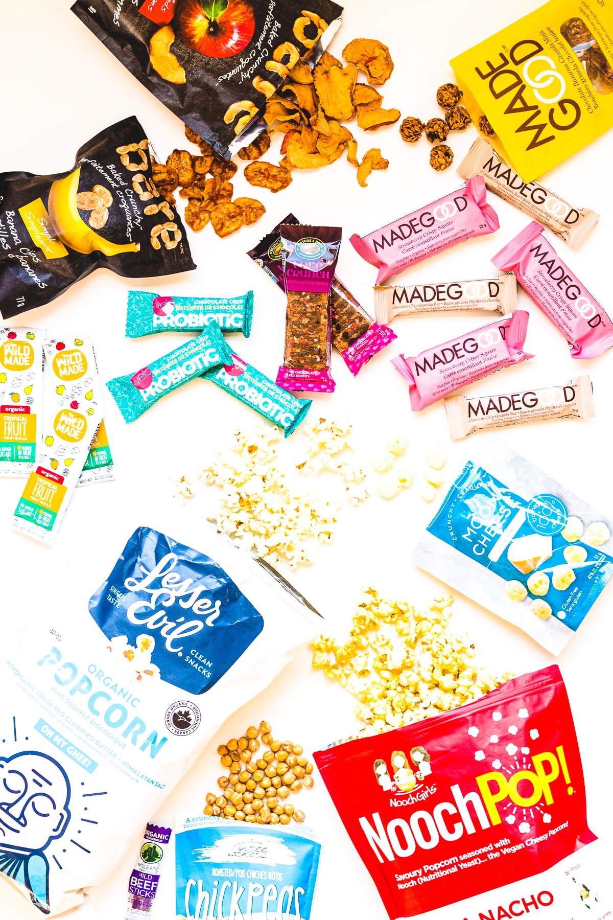 Overhead photo of a variety of healthy packaged snacks.