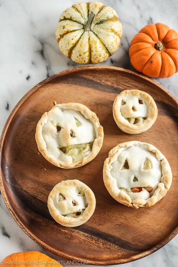 Jack O Lantern shaped chicken pot pies.