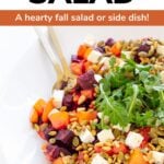 Close up photo of a salad with text overlay "Pumpkin Beetroot Salad: A hearty fall salad or side dish"