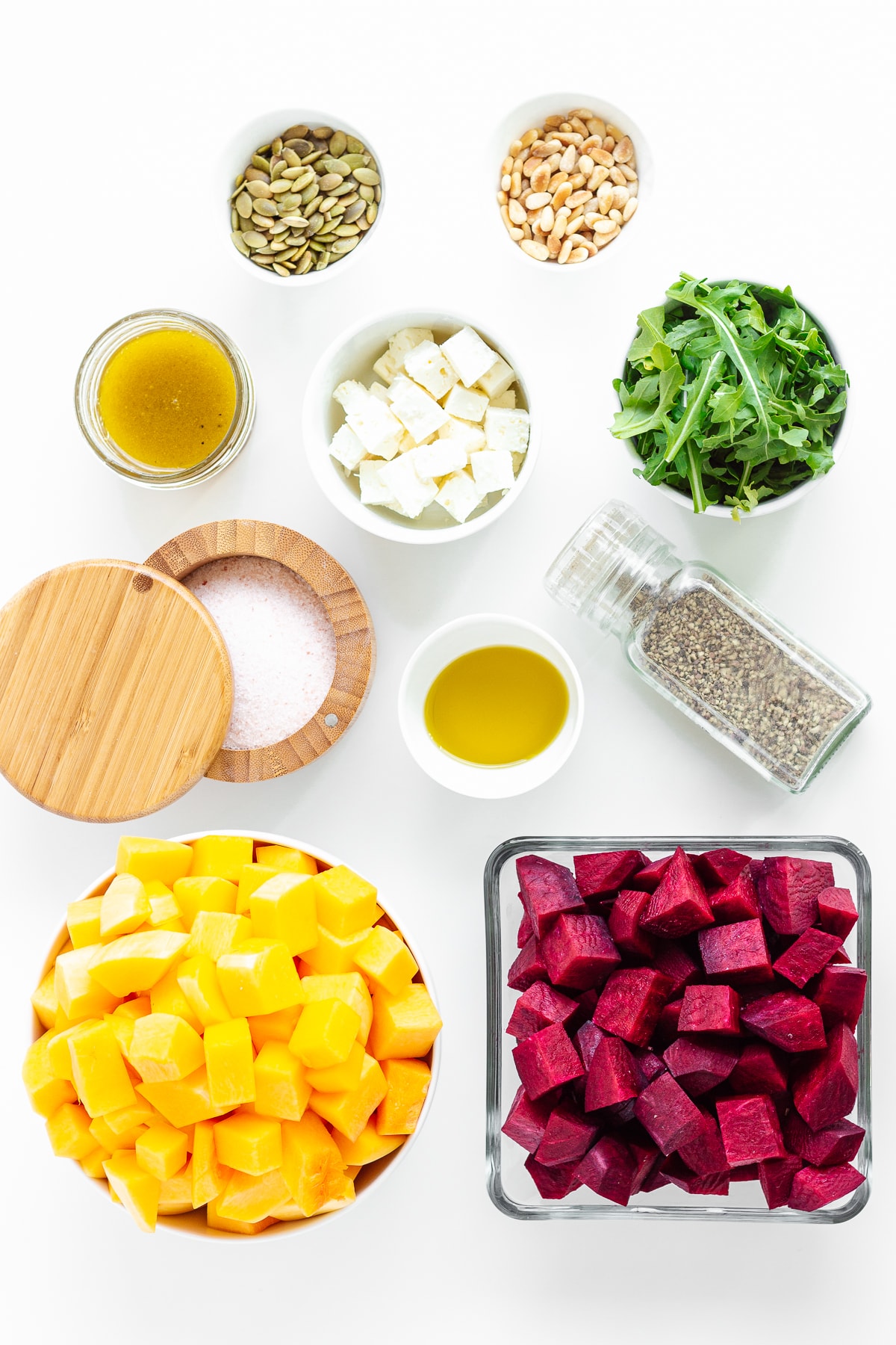 Overhead photo of ingredients needed to make a roasted pumpkin and beetroot salad.