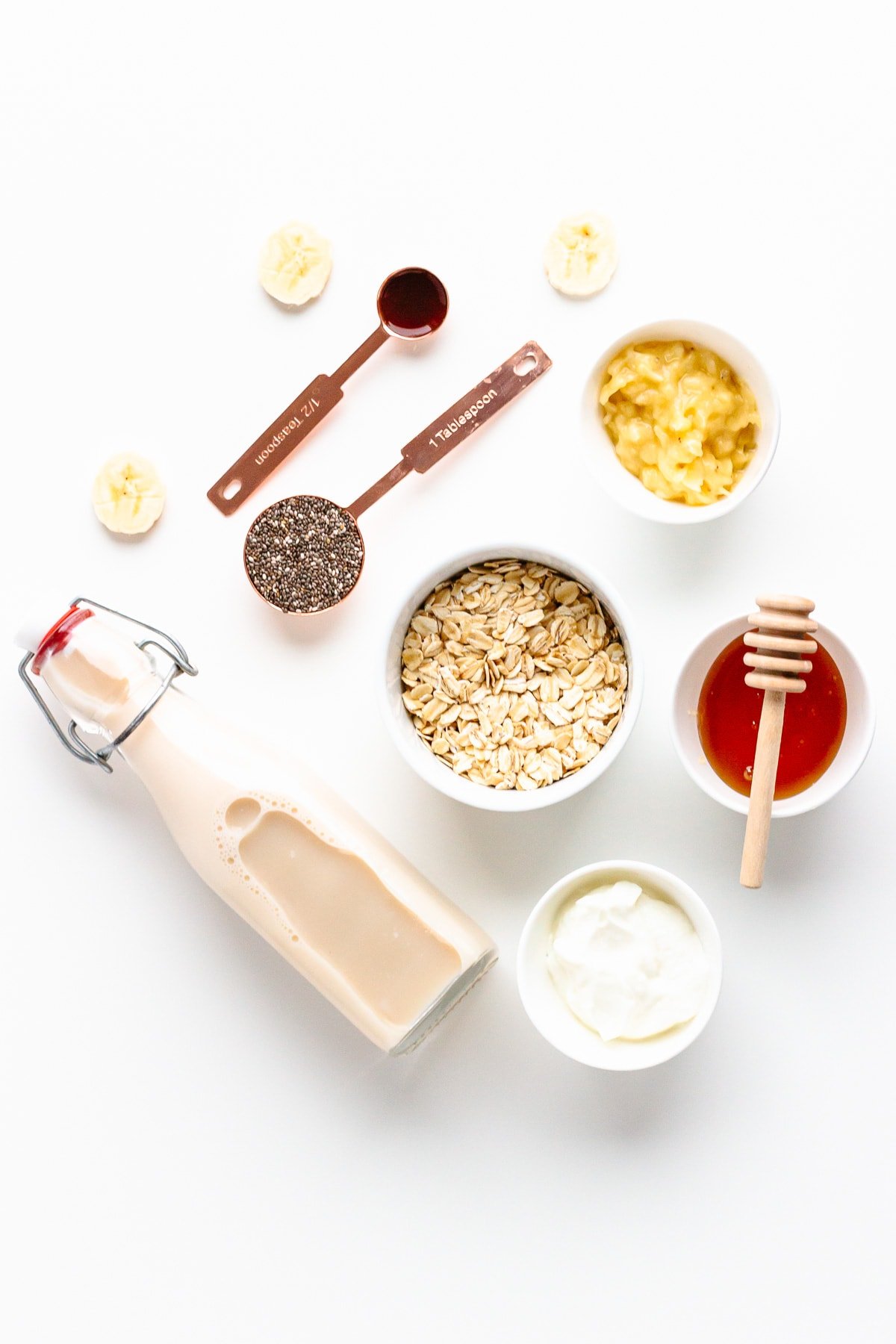 Overhead shot of the ingredients needed to make banana overnight oats.