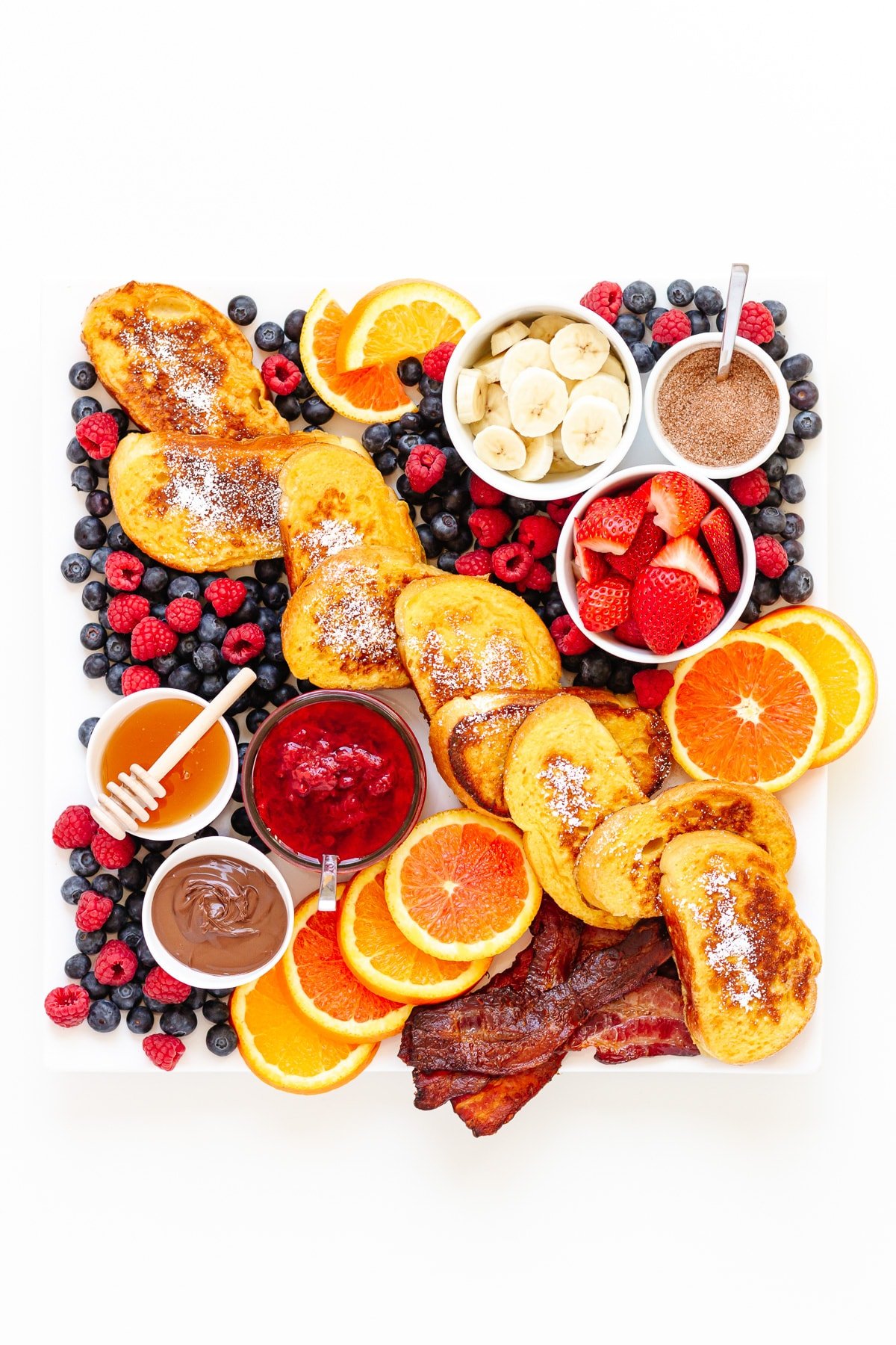 French toast breakfast platter on a white background.