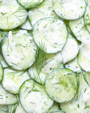 Close up of cucumber yogurt salad with dill.