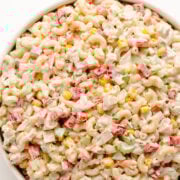 Chicken macaroni salad in a white serving bowl.