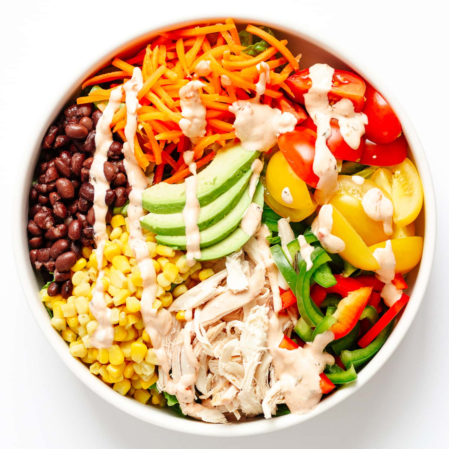 Nourish bowl with a variety of veggies and leftover turkey.