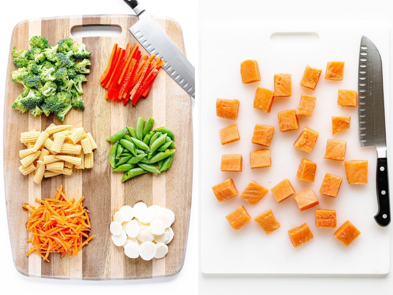 Wooden cutting board with a variety of veggies chopped for stir fry and a white plastic cutting board with cubed salmon.