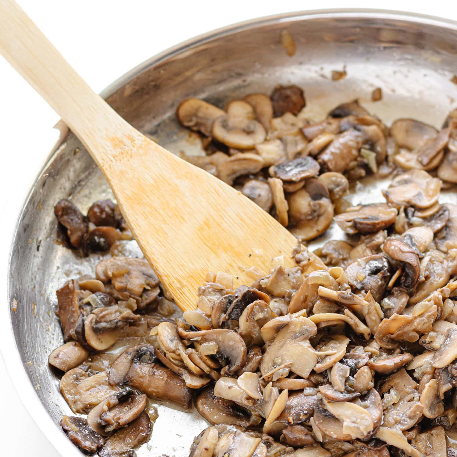 Deglazing pan of sautéed mushrooms, onions and garlic with some dry sherry.