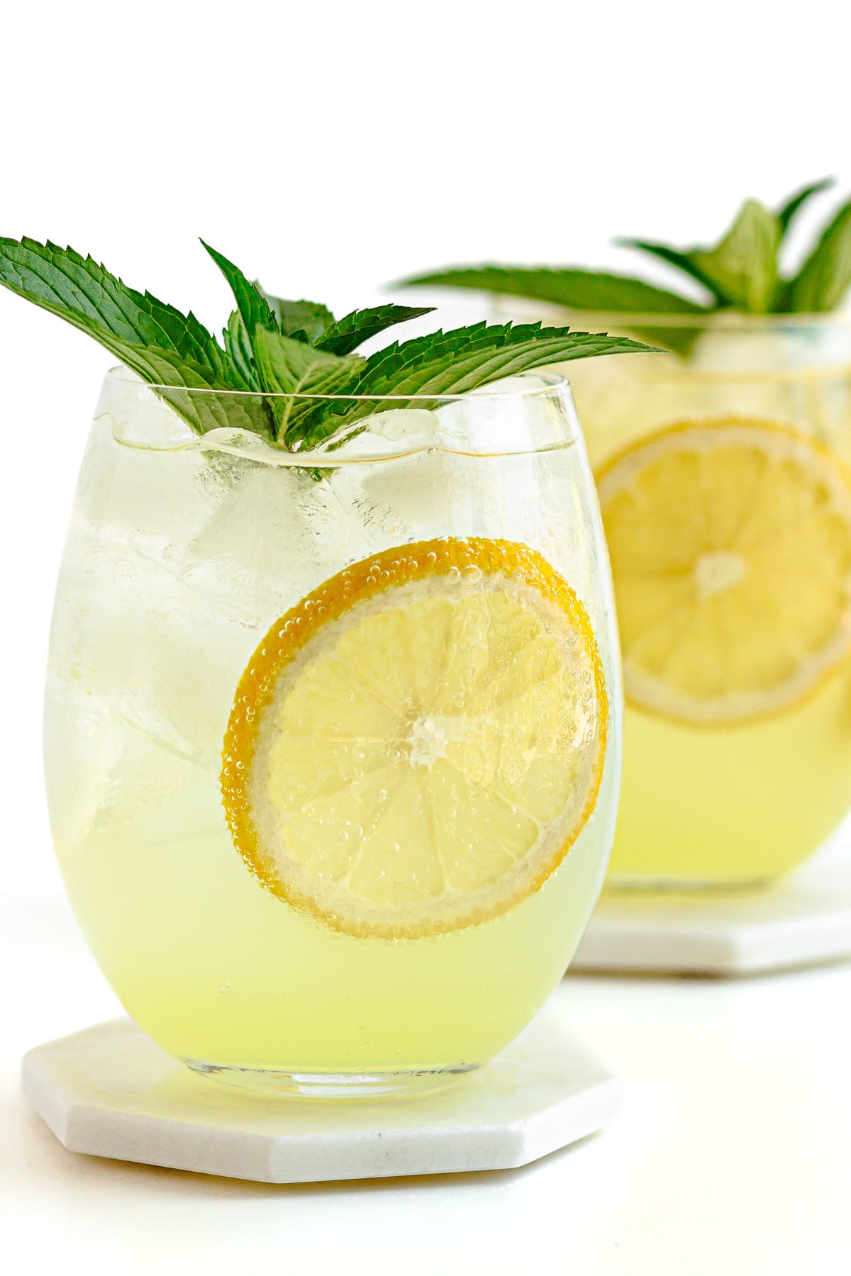 Two glasses of limoncello spritz cocktail.