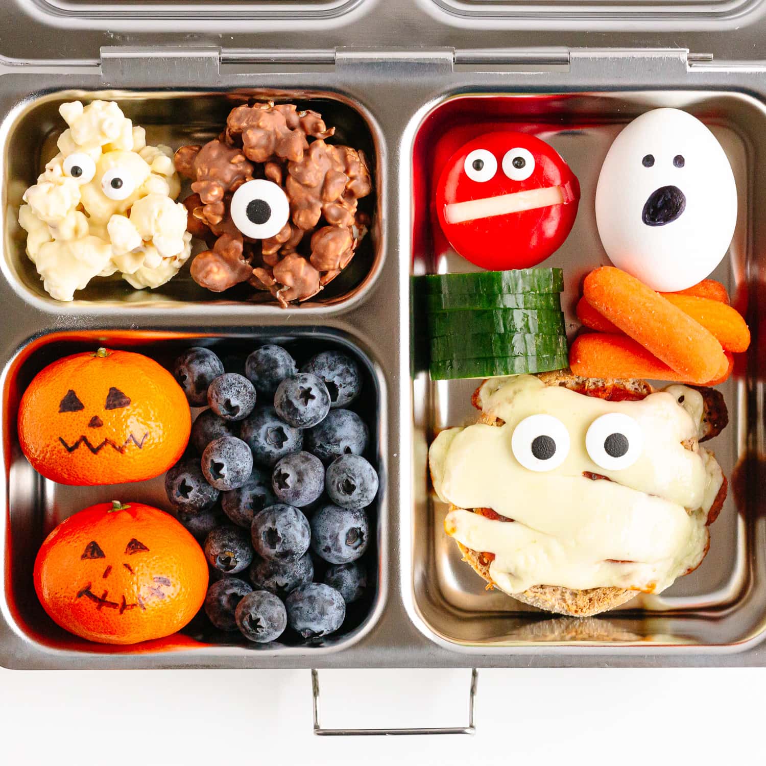 A halloween themed bento box lunch for kids.