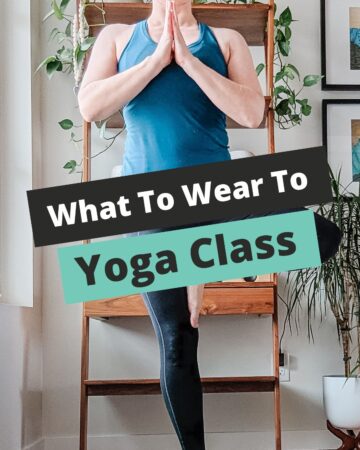 Woman standing in yoga tree pose with text overlay that reads "What To Wear To Yoga Class".