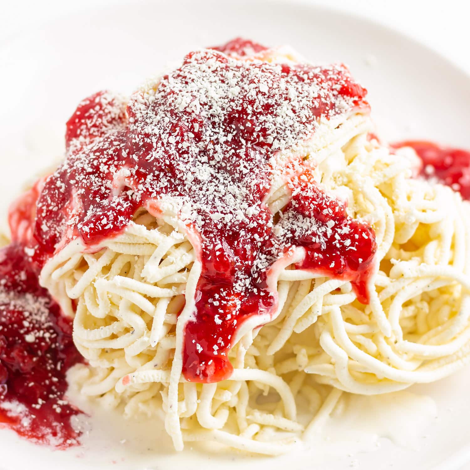 German spaghetti ice cream on a white plate.