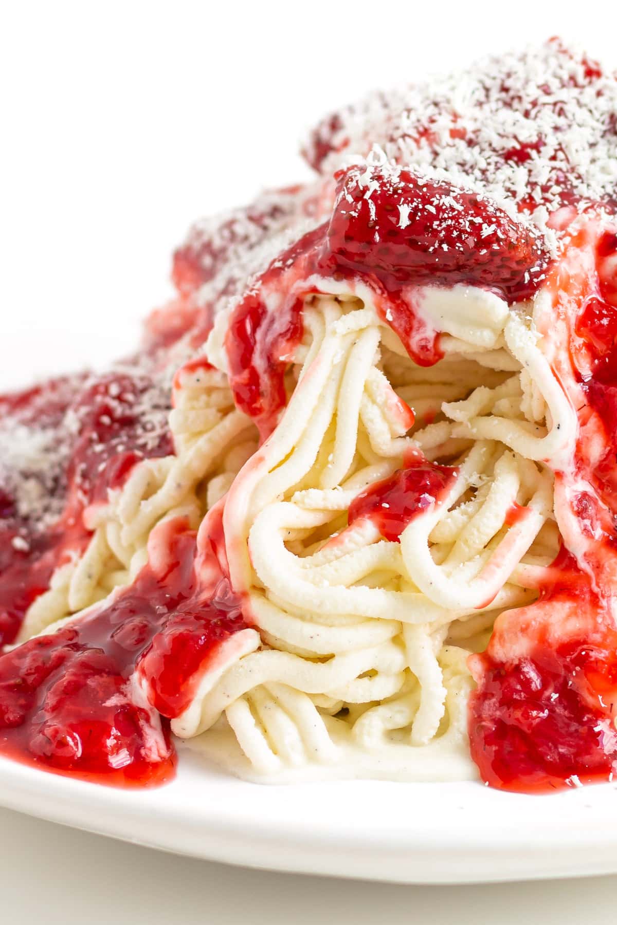 Spaghetti ice cream on a plate.