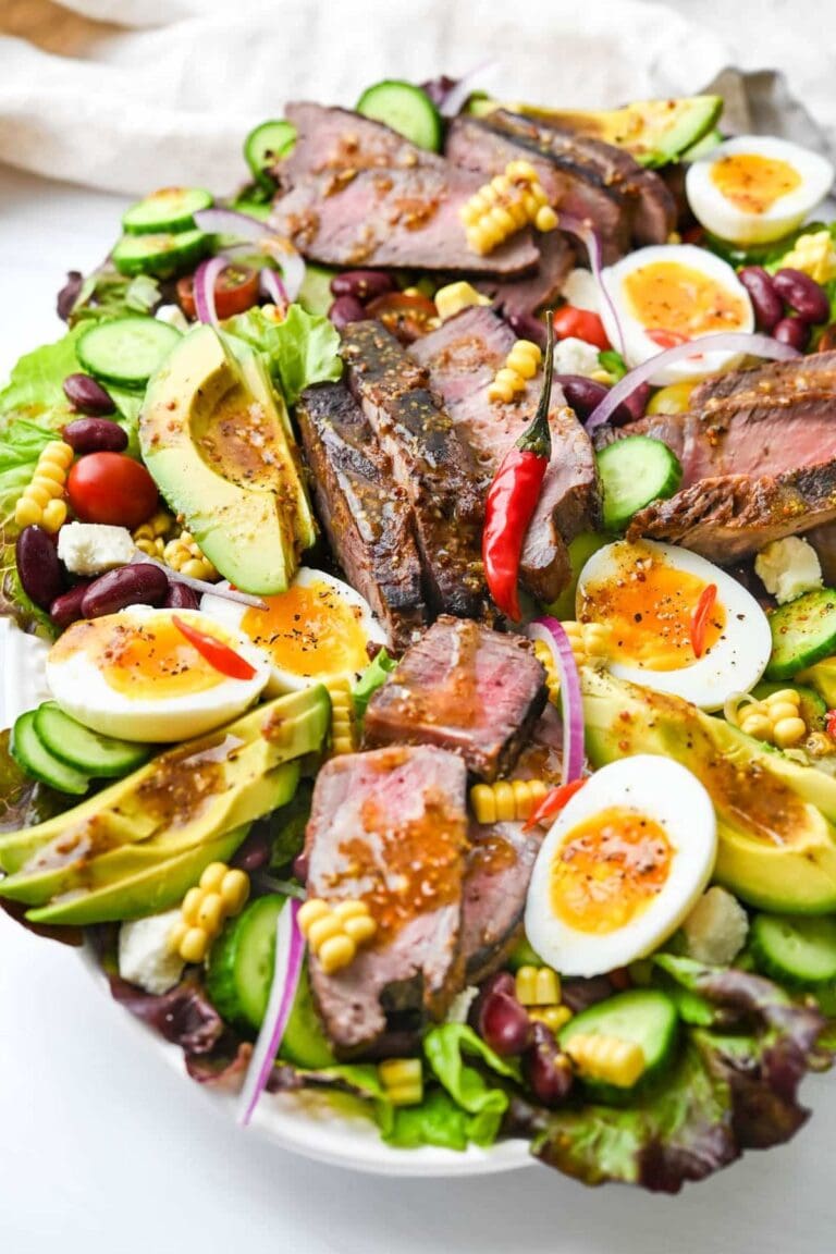 A large serving platter of southwestern steak salad.