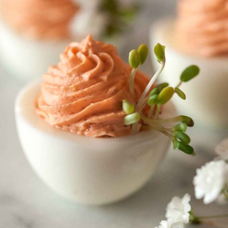 Pink devilled eggs.