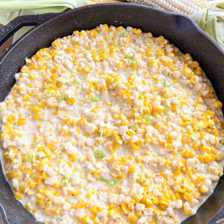 Southern style creamed corn in a cast iron skillet.
