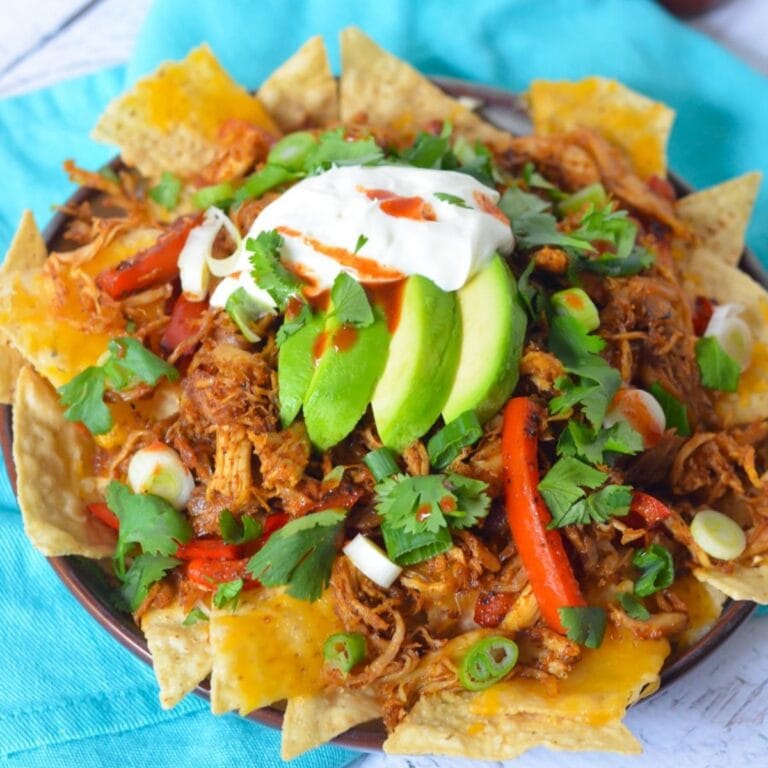 Plate of turkey carnitas nachos.