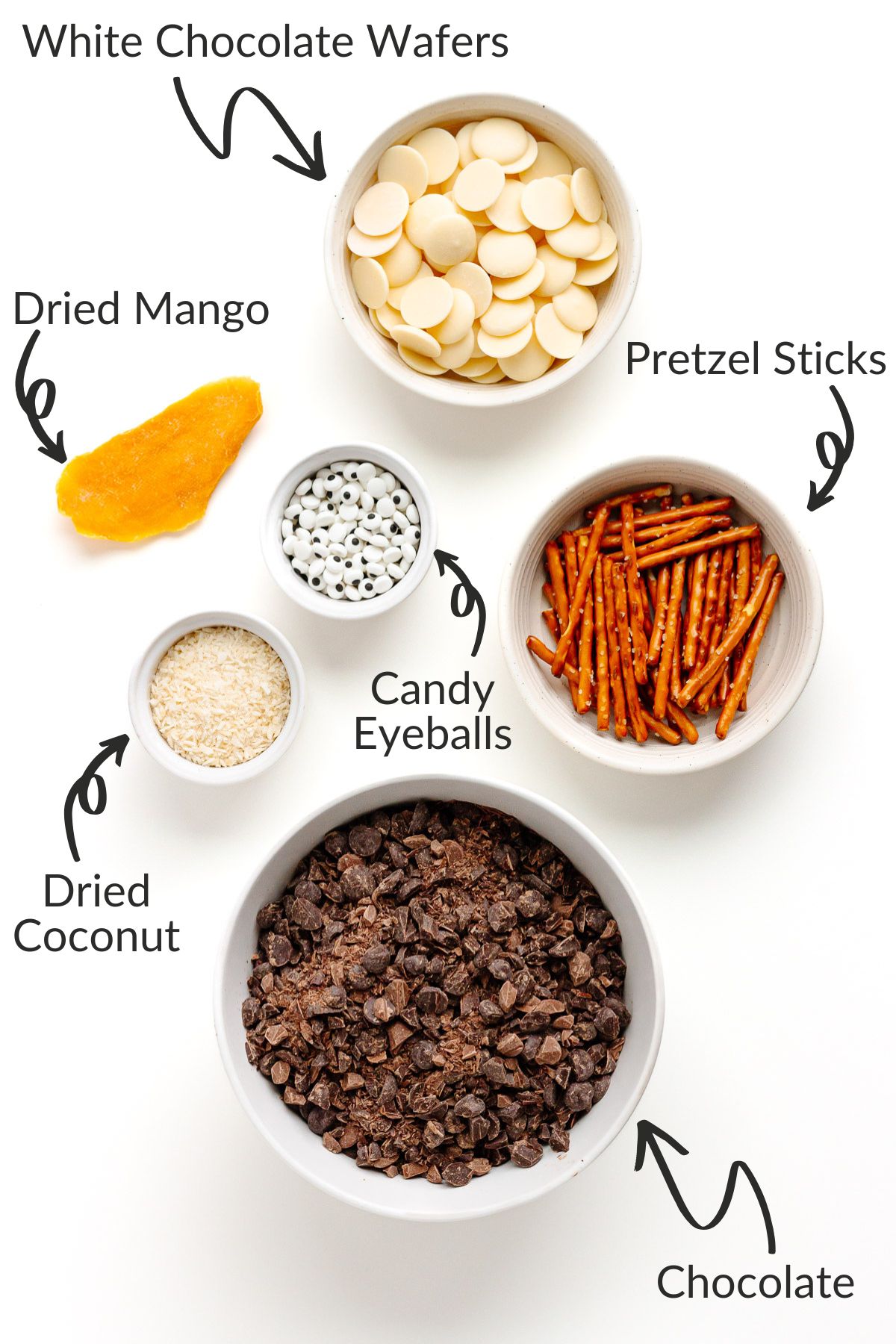 Labelled photo of ingredients needed to make Christmas snowman chocolate bark.