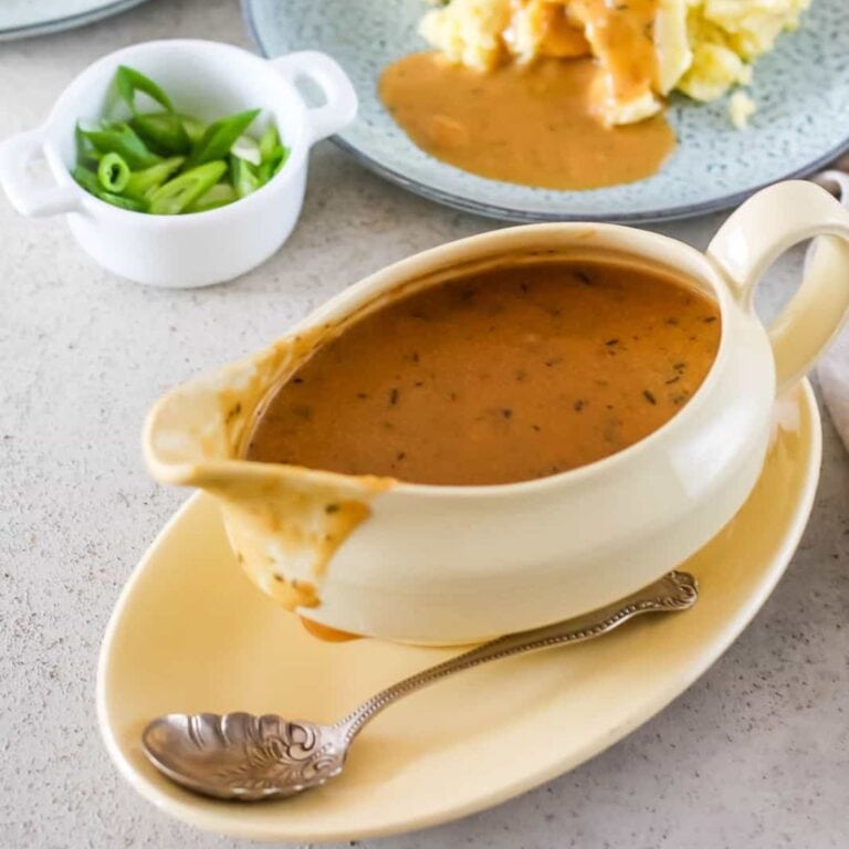 Gravy boat filled with vegan gravy.