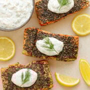 Herb crusted salmon filets topped with lemon dill sour cream sauce.
