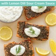 Pinterest graphic for herb crusted salmon with lemon dill sour cream sauce.