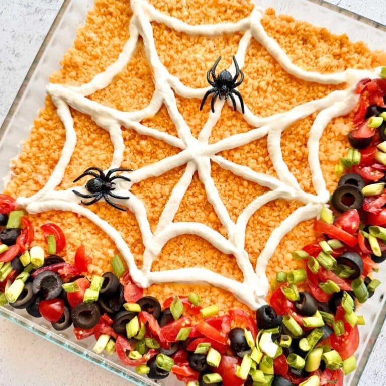 7 layer dip decorated to look like a spider web on top.