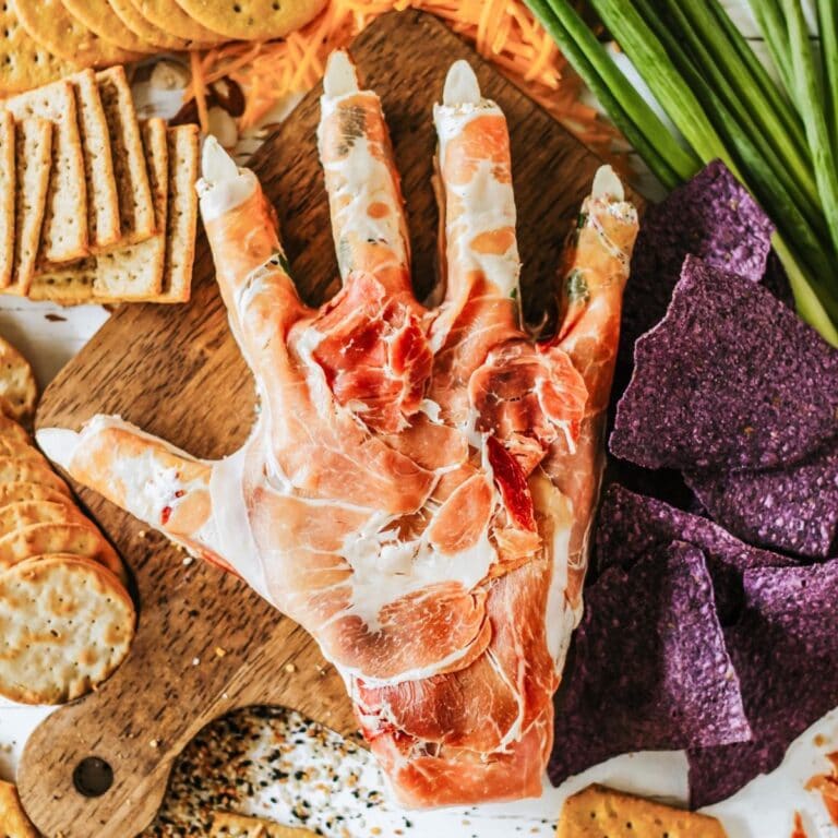 Halloween cheese appetizer shaped like a hand.