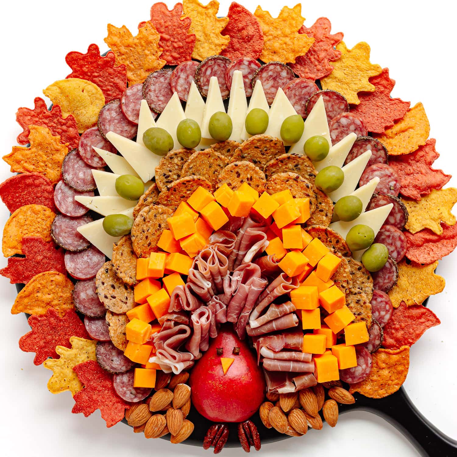 A Thanksgiving charcuterie board in a turkey shape.