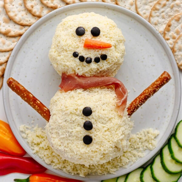 A snowman cheese ball holiday appetizer.