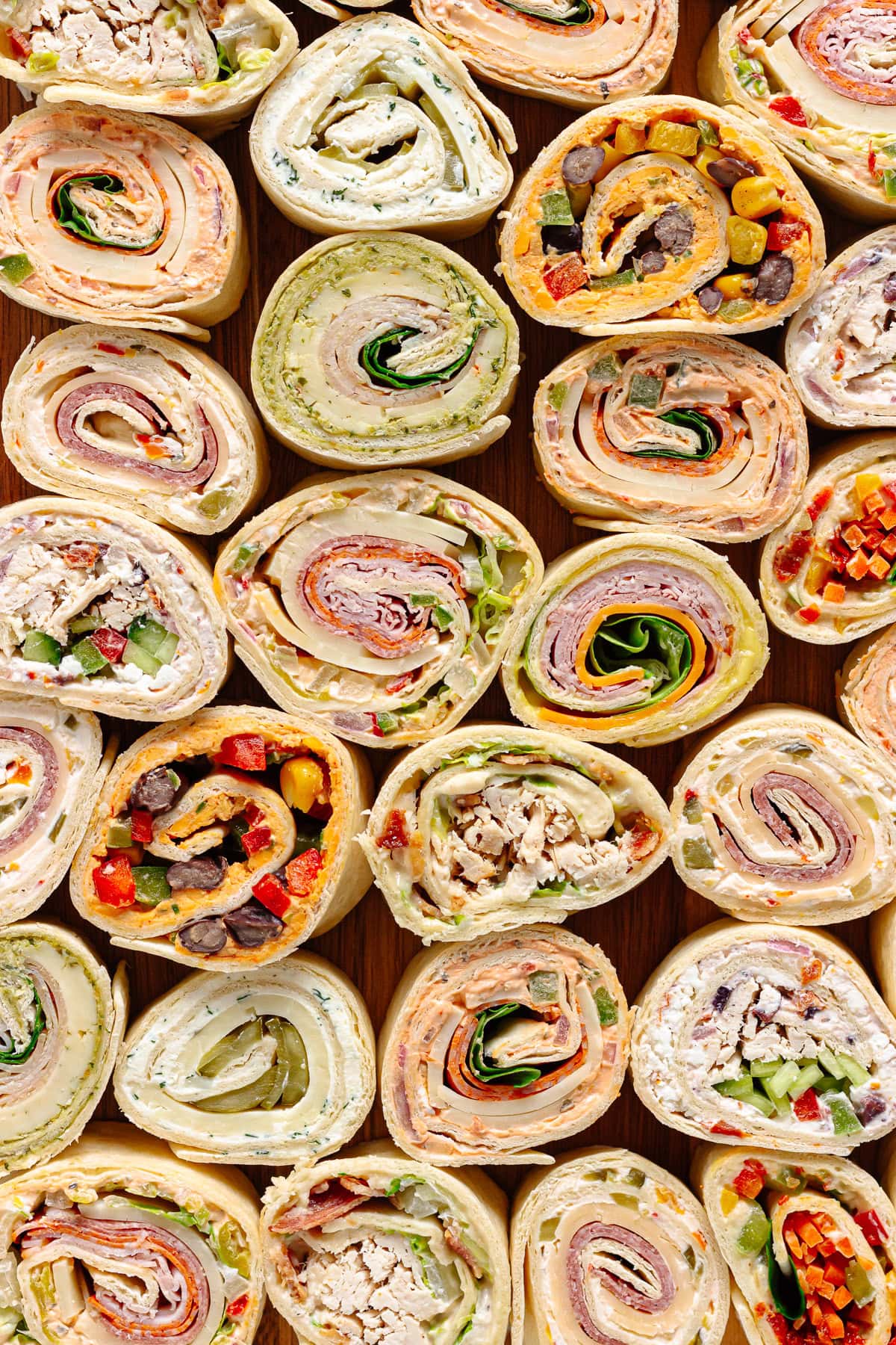 Variety of pinwheels on a board.