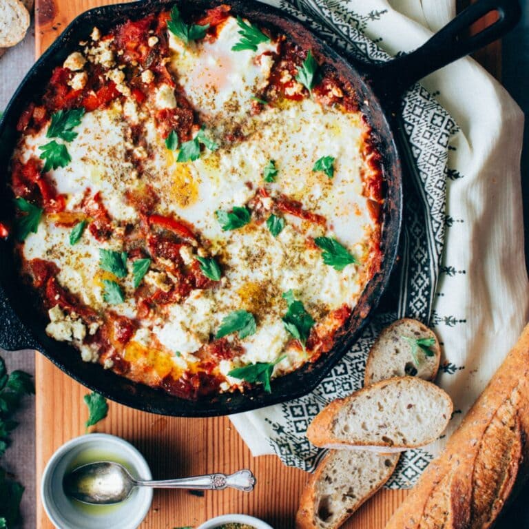 Shakshuka in a cast iron skillet.