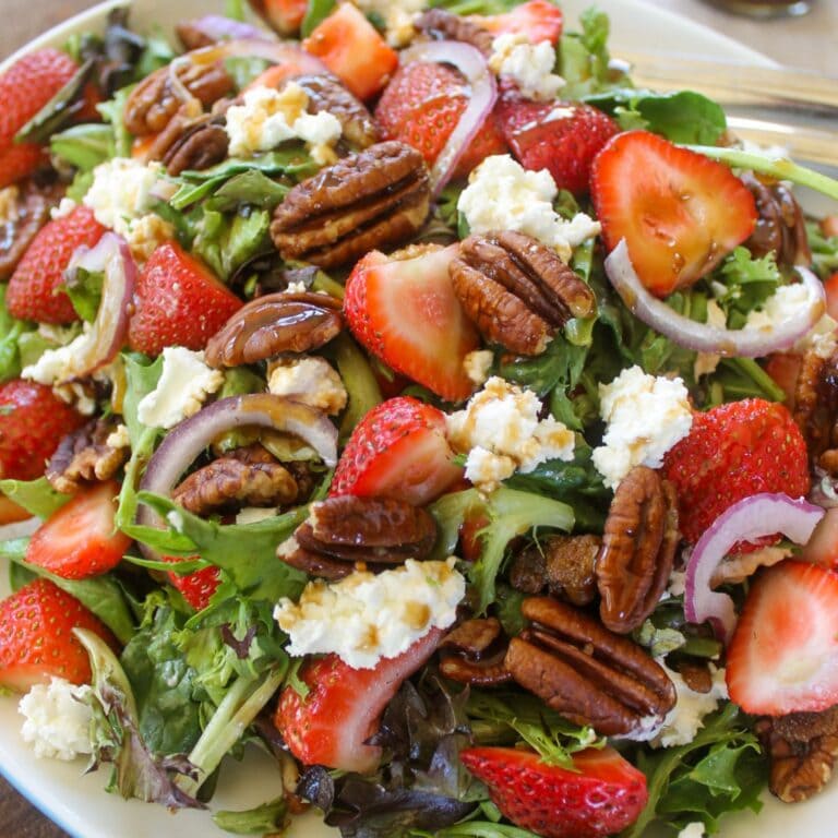 Strawberry goat cheese salad with brown sugar coated candied pecans.